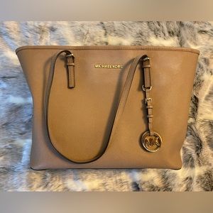 Large Michael Kors Shoulder Tote. Tan in color.